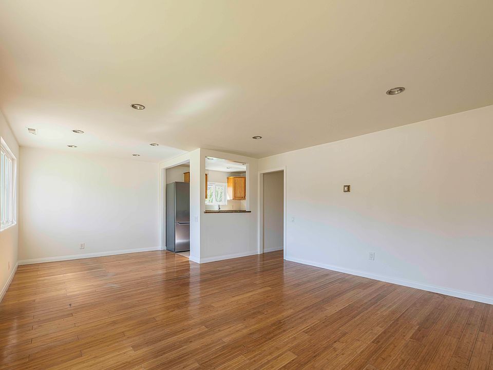 Living and Dining Rooms next to Kitchen
