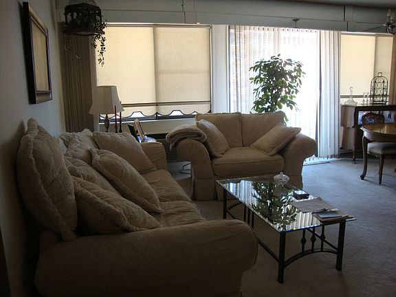 Living Rm w sliders to balcony 