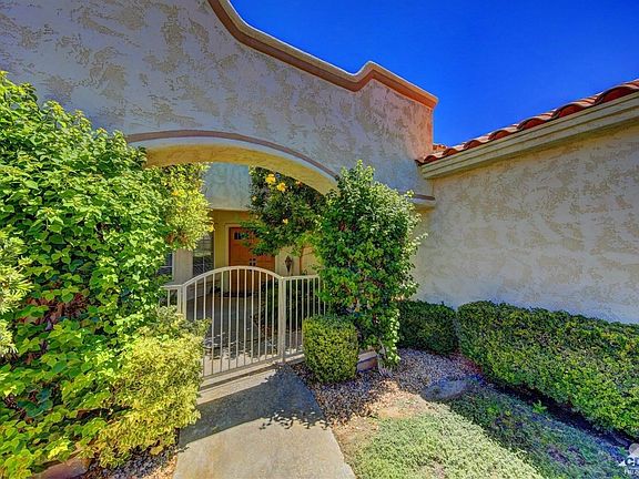 Gated front courtyard.