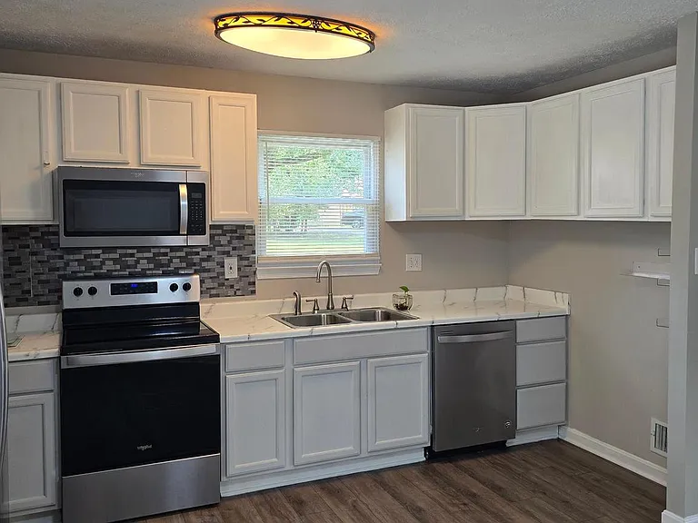 8313 Gibbons Dr — Photo 2