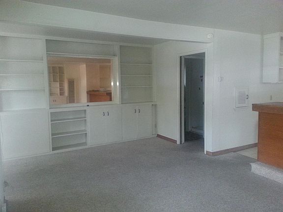 East End of Living/Great Room, Breakfast Bar at Right. Built