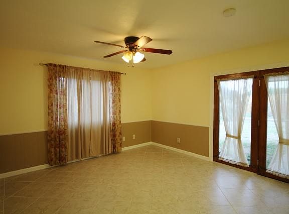 Informal dinning area and back yard exit.
