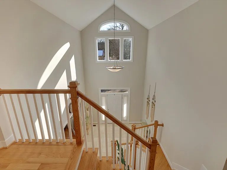 Upper level landing - dual staircase from foyer and mudroom / garage