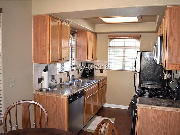 4th image of 8425 Running Deer Ave Unit 203