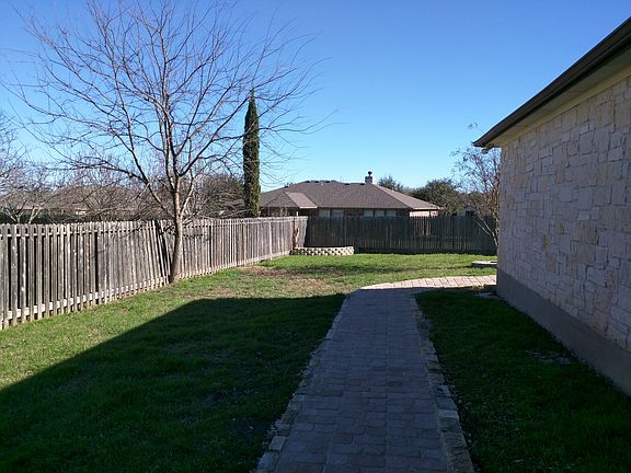 Walkway surrounds house