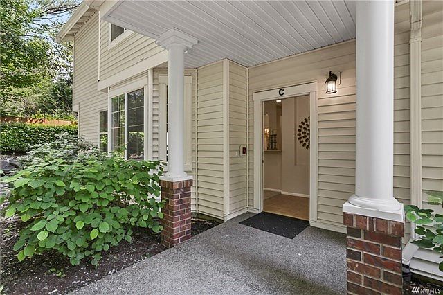 Welcome Home! Large covered entry hidden on the side of the building.