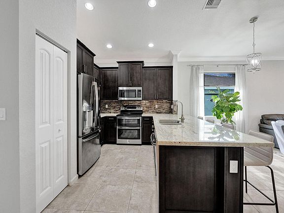 5th image of 4824 Foxtail Palm Court
