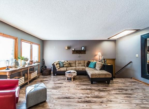 Open Living with New Flooring throughout.