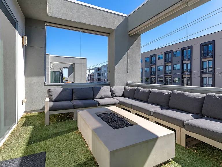 3rd Level Outdoor Patio Space with Gas Fire Pit accessible via Primary Bedroom and other Bedroom