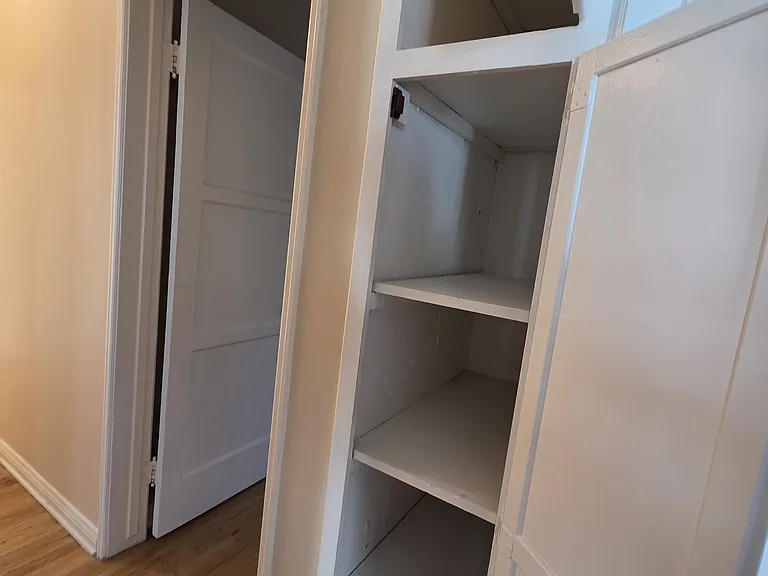 Hall storage closet very deep shelves