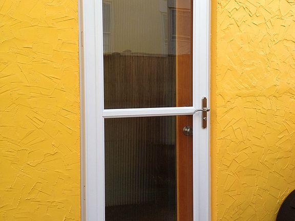 Brand new entry/storm doors
