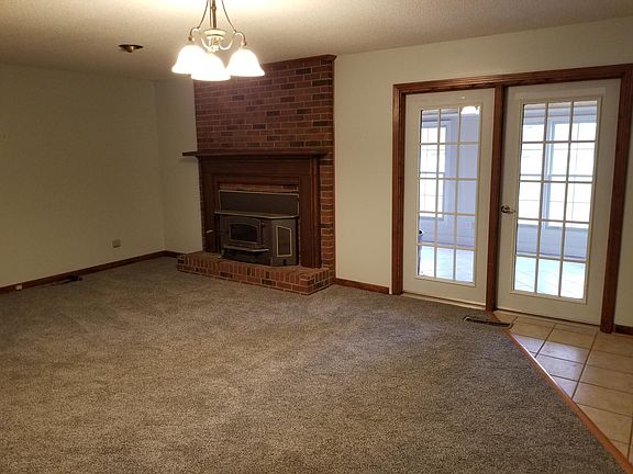 Den- Fireplace into Sunroom