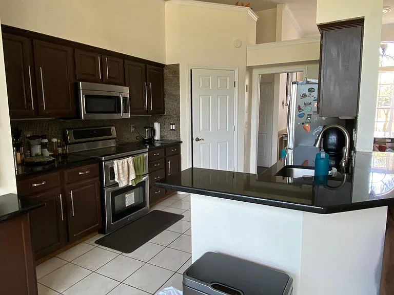 Kitchen with all stainless steel appliances