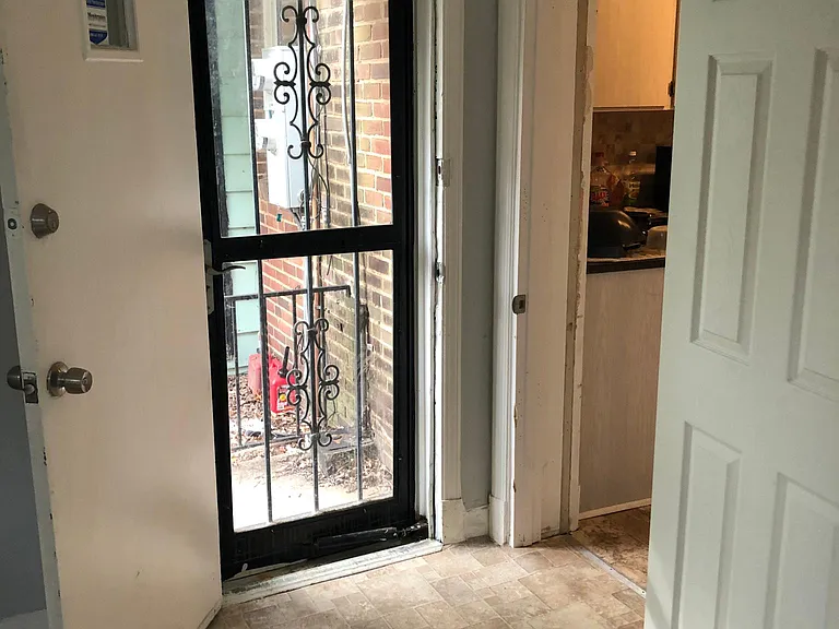Small bedroom has separate entrance to backyard