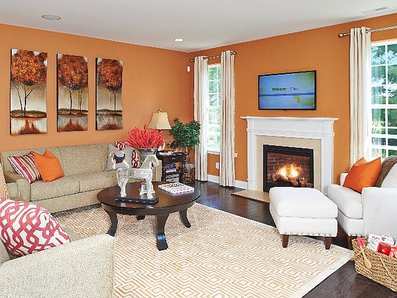 Oversized family room with cozy fireplace (model)