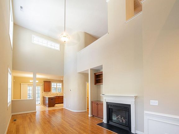 LIVING ROOM WITH VIEW OF LOFT