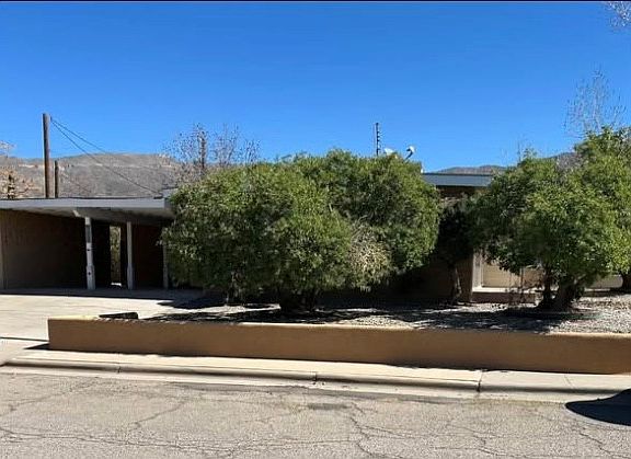 West facing side yard - showing carport