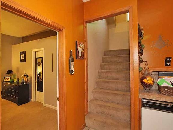 Stairs to upstairs/Bedroom 2