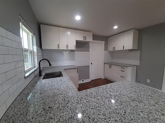 Granite Countertops and Bar in Kitchen