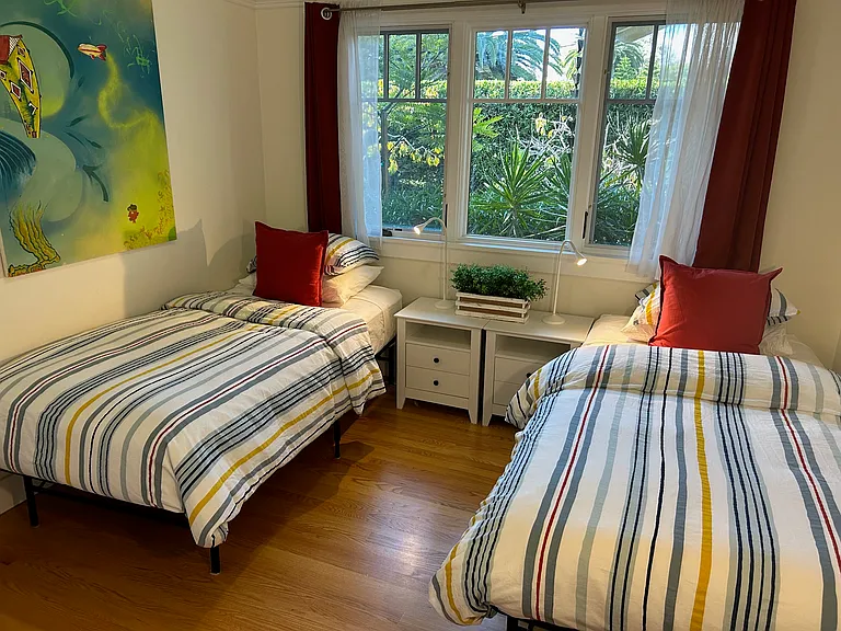 King bedroom, shown set as a twin.
