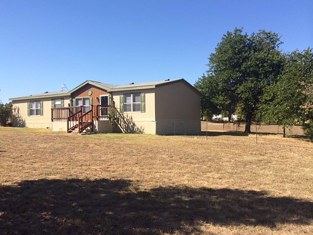 Front and fenced back yard