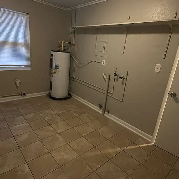 Large Laundry room with storage space