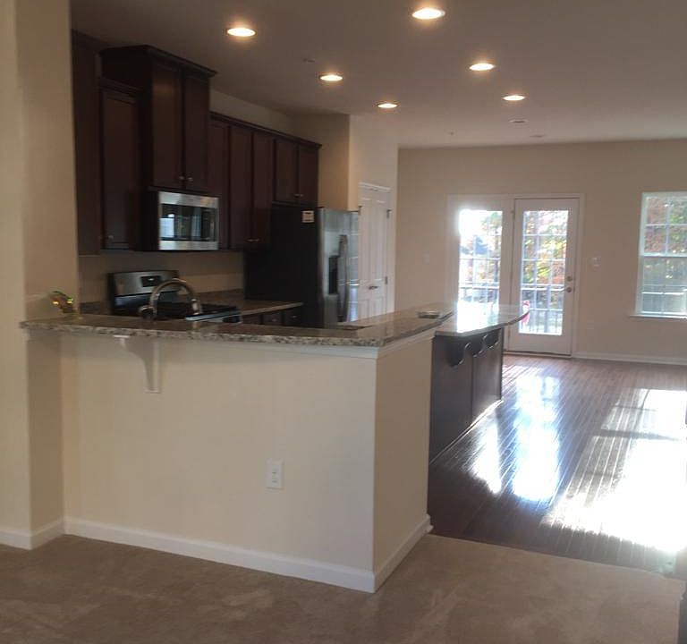 kitchen on the 2nd flloor with access to balcony overlooking Gazebo