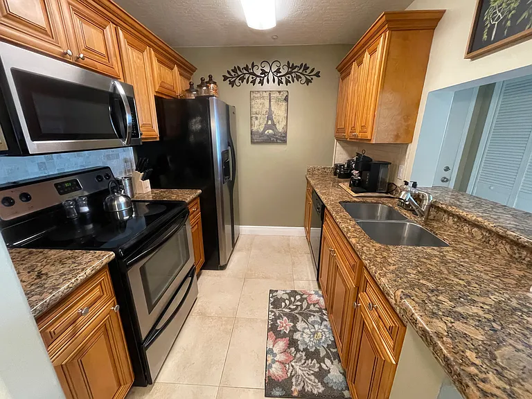 7667 N Wickham Rd #408 — Photo 6