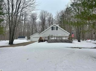 10743 Sprucedale Cir, Elmira, MI 49730
