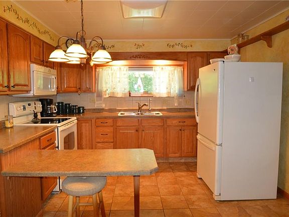Updated Kitchen with Tile Flooring.