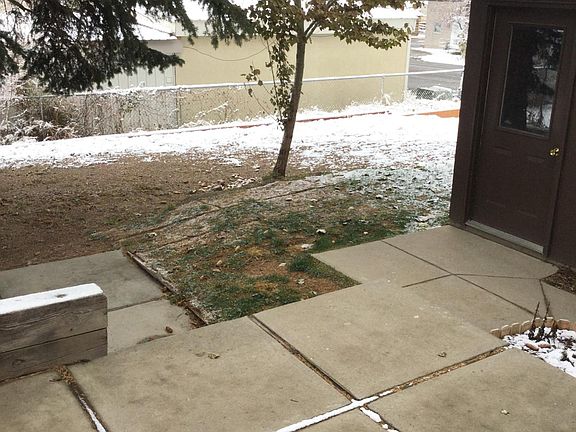 PRIVATE PATIO AREA IN LARGE FENCED YARD