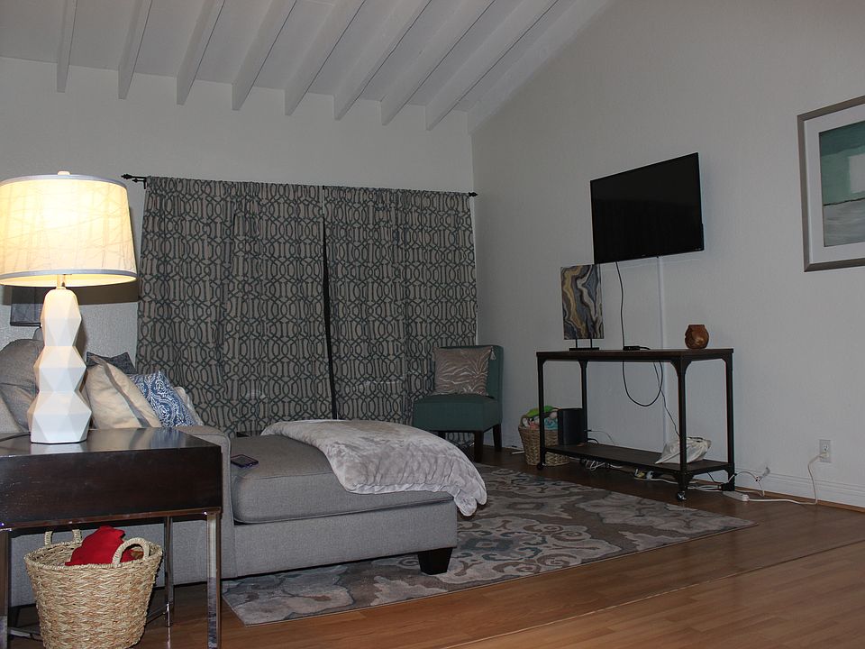 Living Room - Furnished. Vaulted Ceiling