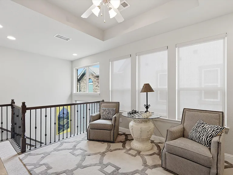 Discover the perfect bonus room designed to adapt to your lifestyle, whether utilized as a cozy media lounge, a home office, or a creative studio space.