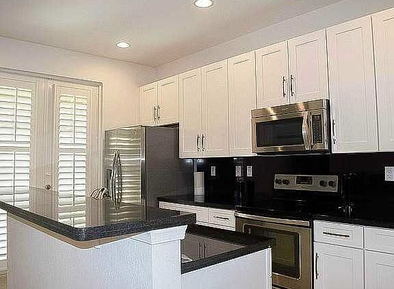 Upgraded designer kitchen showcasing 42-inch cabinetry with
