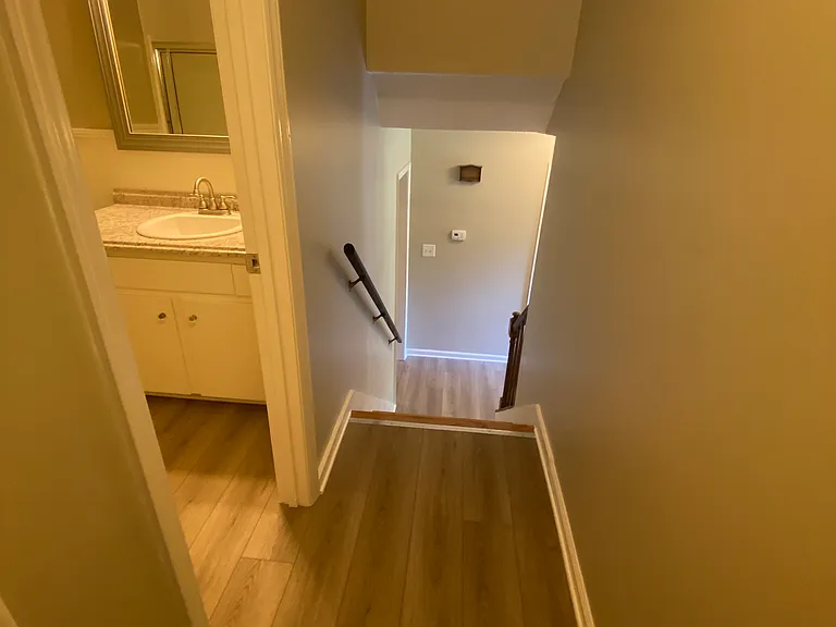 View of hallway looking down to the foyer
