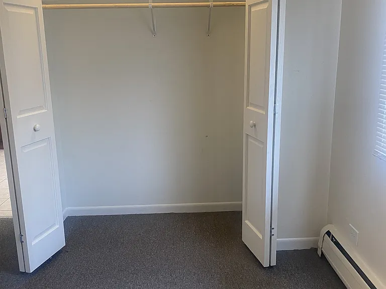 Opened / Bedroom Closet Doors