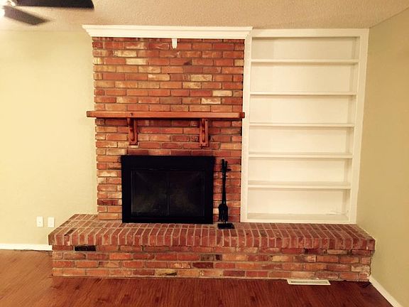 Fireplace with bookshelf