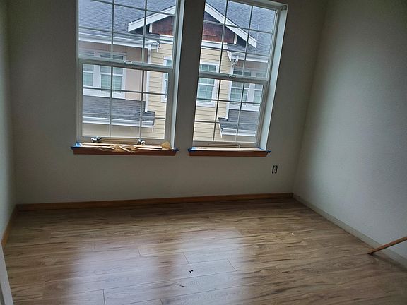 Second Bedroom still has painter tape up and the wooden blinds are not yet placed but will be there next week.