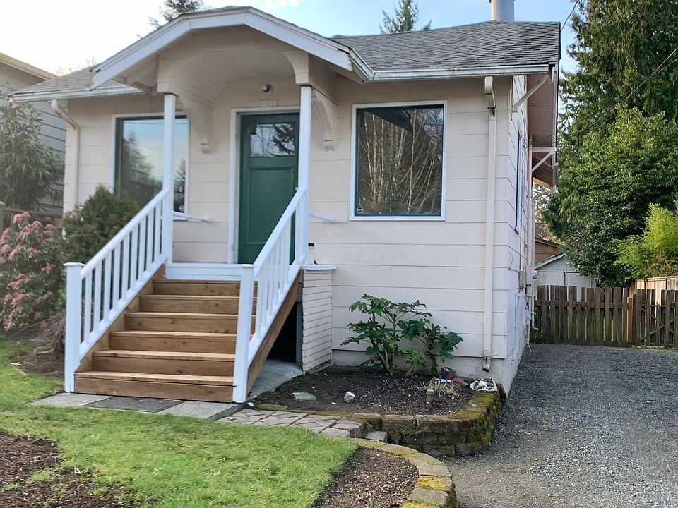 Front of house with long driveway for parking, plus off street parking in front.