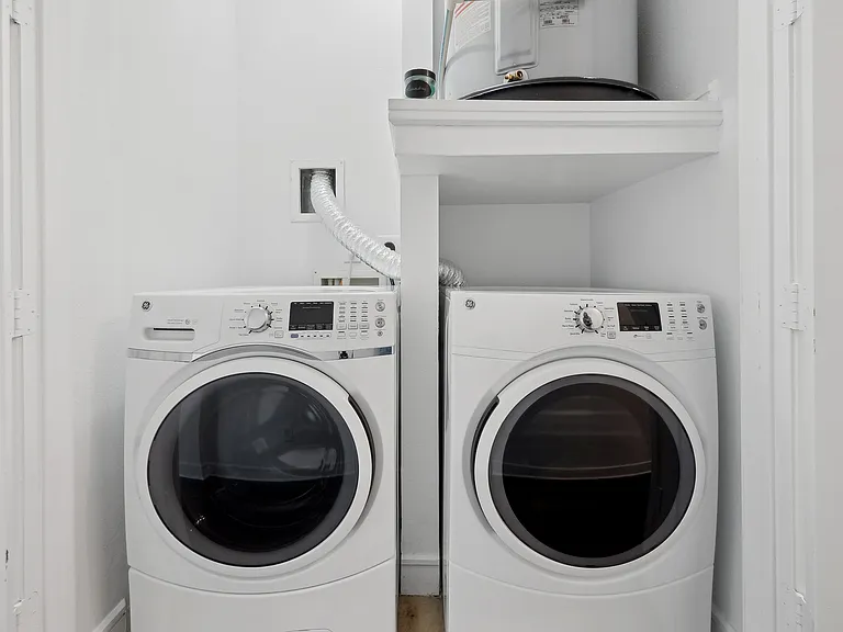 Efficiently designed laundry space with modern appliances to make chores a breeze. Efficiently designed laundry space with modern appliances to make chores a breeze.