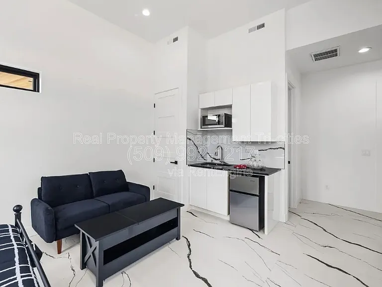 6982 W 22nd Ave — Photo 27