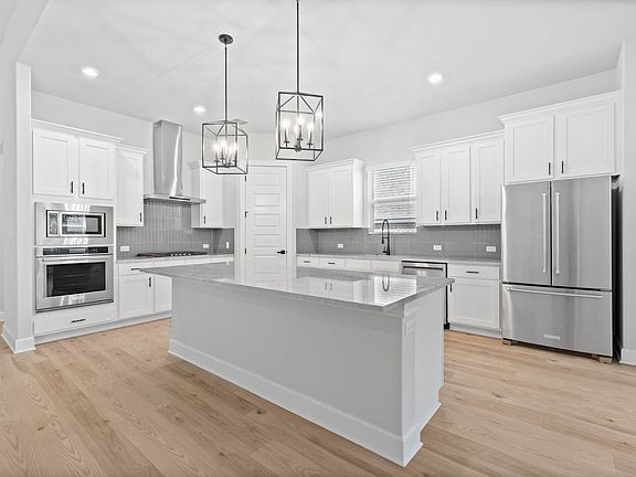 Fully loaded kitchen with stainless appliances