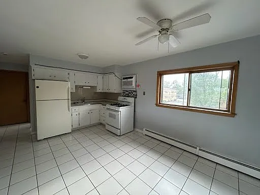 Bright, neutral kitchen and dining room space