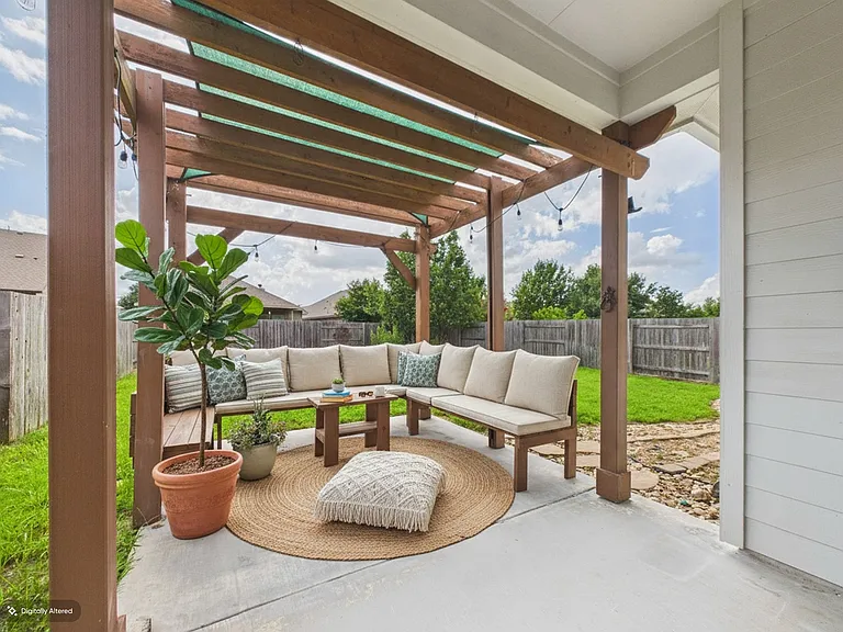 Back yard Pergola with built in seating off patio