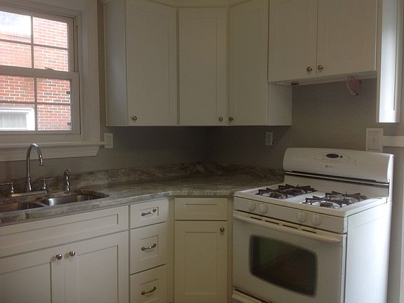 Gas stove, fan not yet installed when picture taken