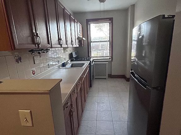 2nd image of 77-10 Ditmars Blvd #C-1