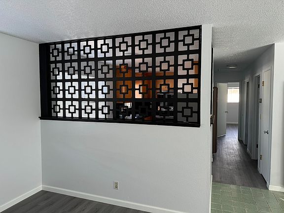 Hallway with breakfast nook in kitchen