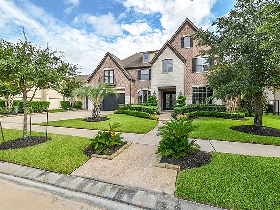 Superbly manicured garden enhances the pretty elevation of this Custom Home in Avalon at Seven Meadows. Freshly painted interior including moldings, cabinets and ceilings. Ready to be called home!