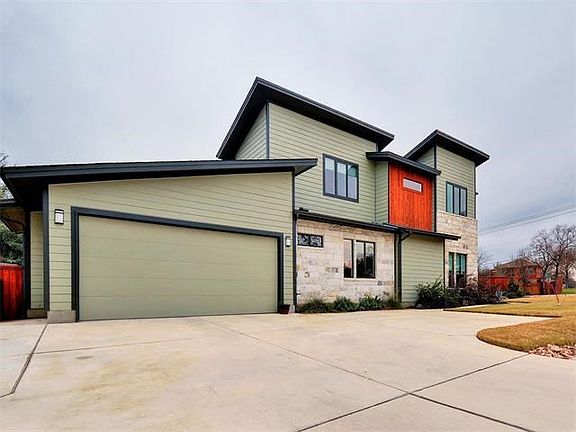 Large driveway. Extra space on left side for RV parking.