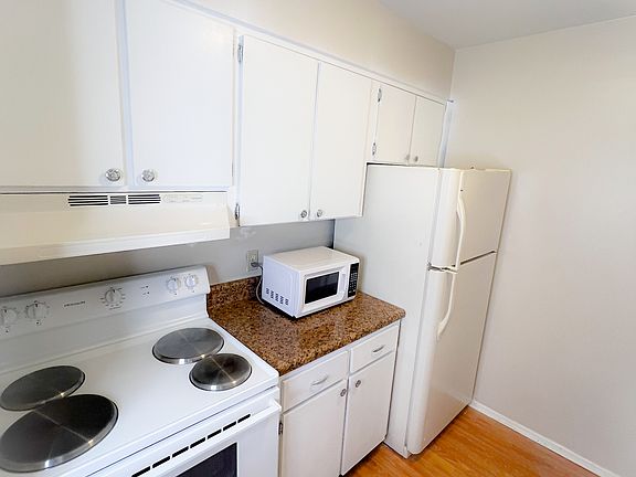 Unit is unfurnished and photos are staged. Furniture not included.